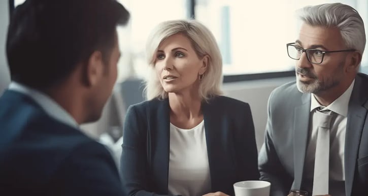 Family Office Members Discussing Investments